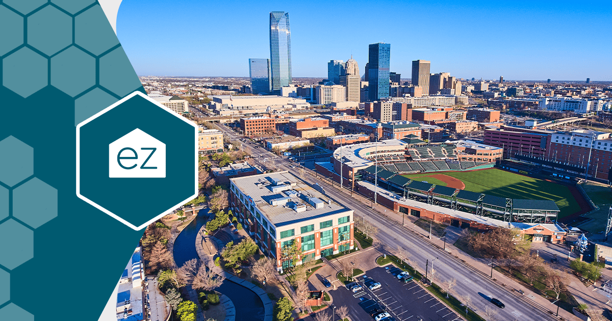Aerial view of Oklahoma City with the downtown ballpark and tree-lined streets