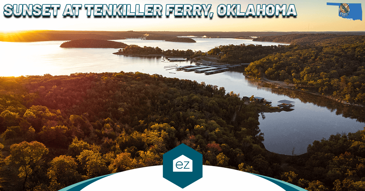 Aerial view of Tenkiller Ferry Lake in eastern Oklahoma at sunset, with wooded hills and a marina
