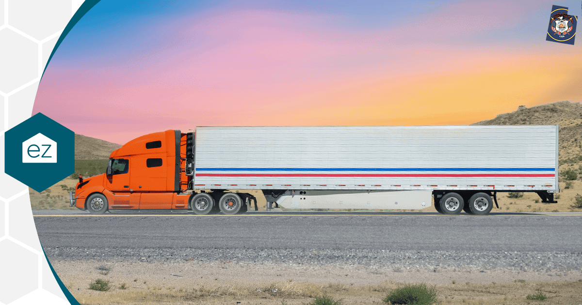 A semi truck parked on a Utah desert highway at sunset