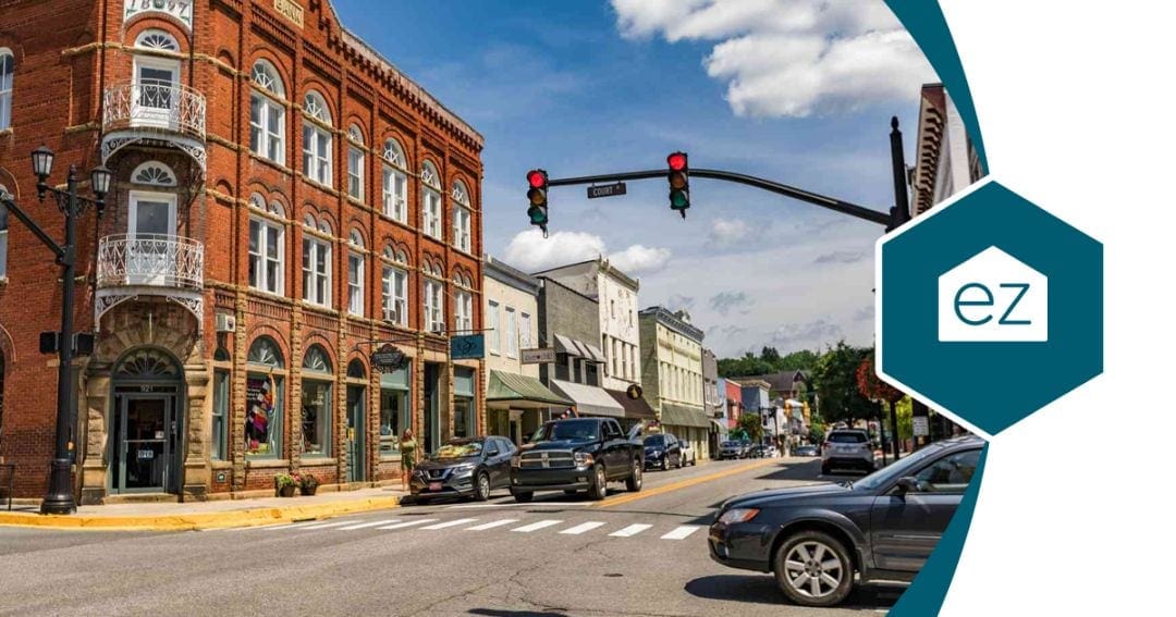 A small West Virginia main street with storefronts and houses