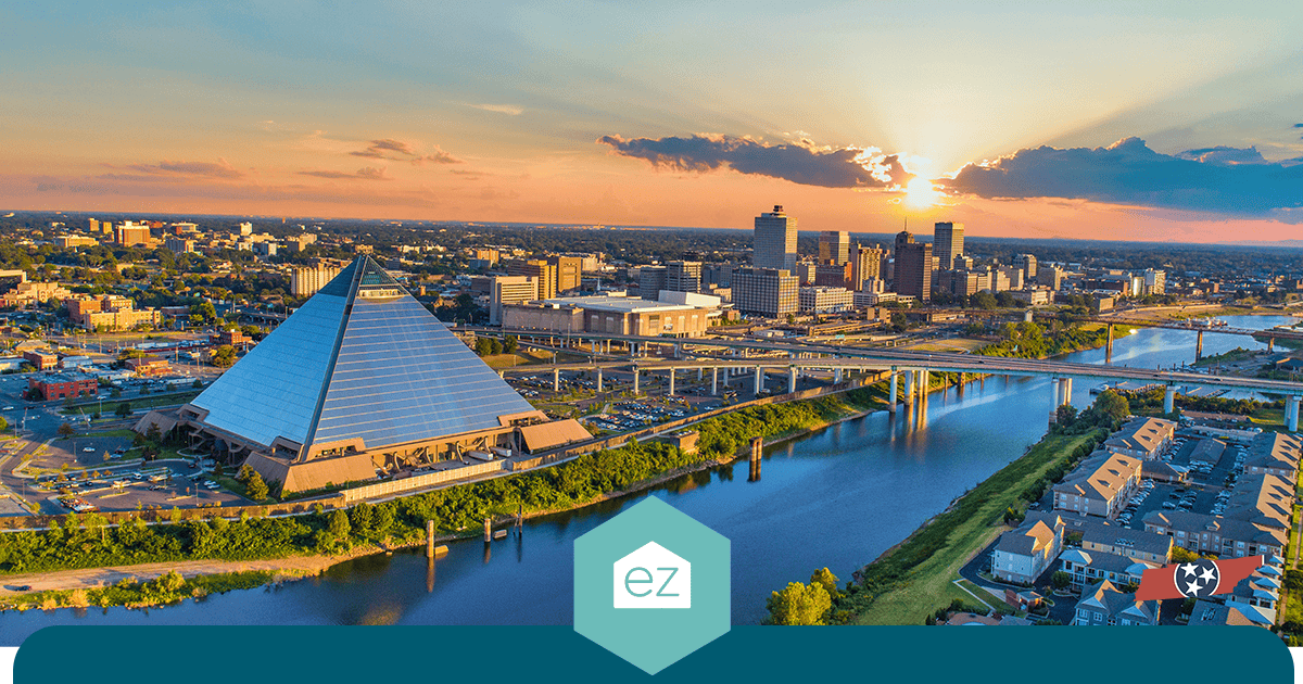 Downtown Memphis, Tennessee at sunset with the pyramid and Mississippi River