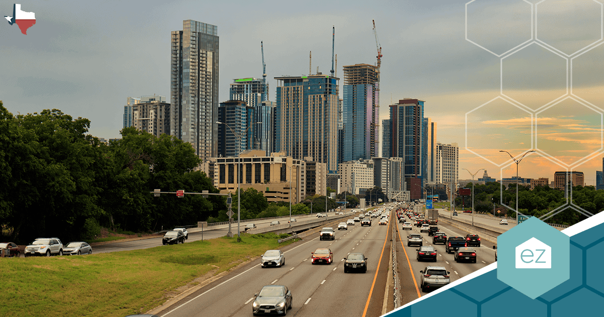 The Austin, Texas skyline beyond a multi-lane highway.