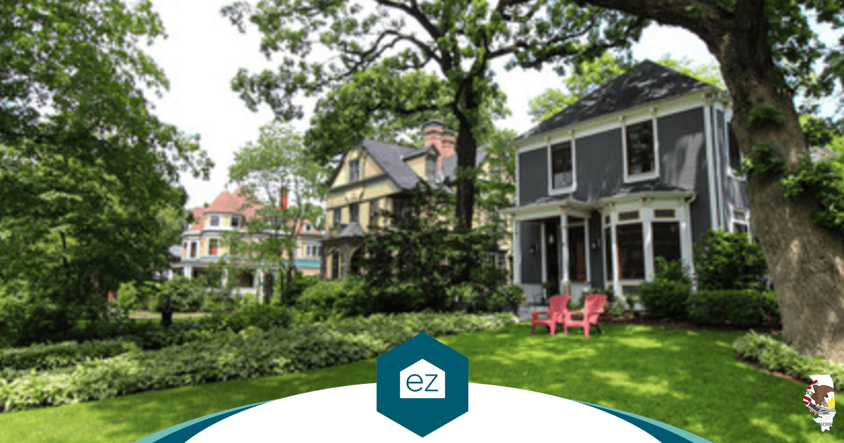 Row of historic single-family homes on a tree-lined Illinois street