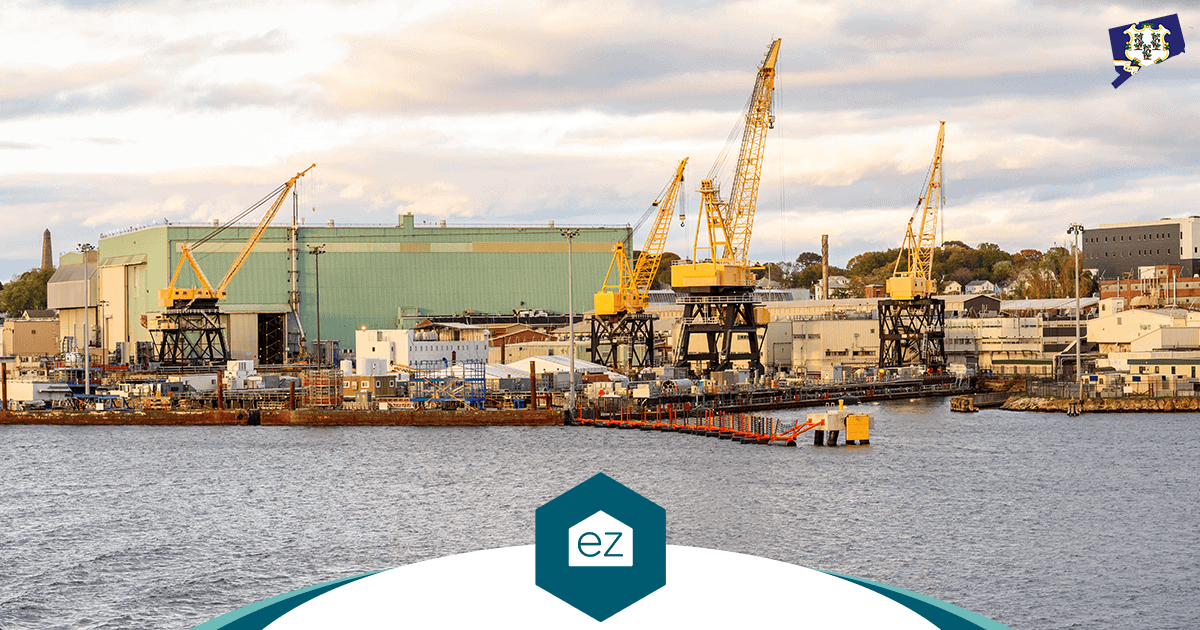 Shipyard cranes along the southeastern Connecticut shoreline near Groton