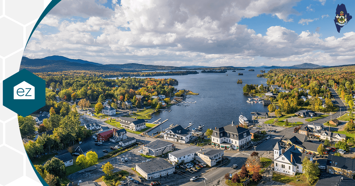 Aerial view of Greenville, Maine on Moosehead Lake in autumn, a rural Highlands town