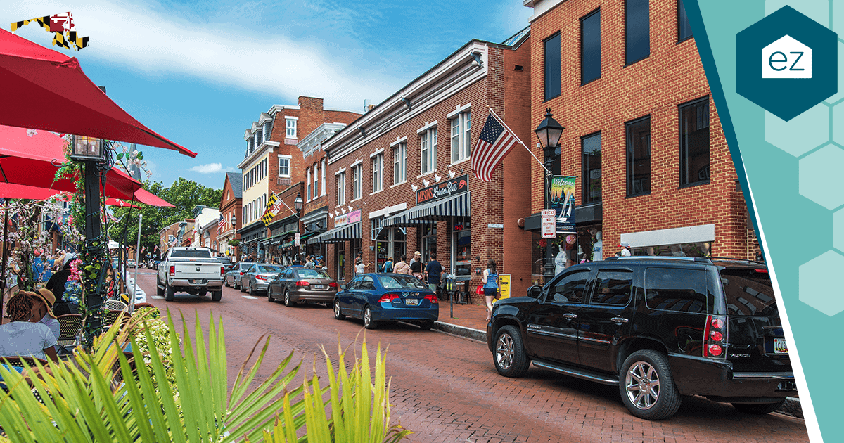 Brick-paved street lined with shops and American flags in Annapolis, Maryland