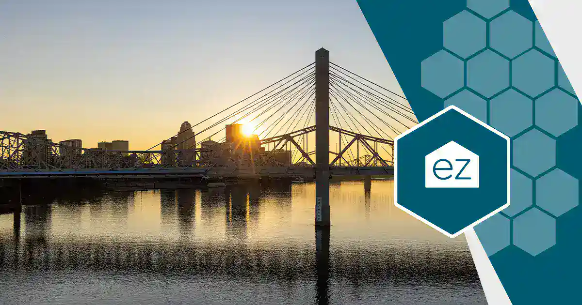 Sunrise over the Ohio River and a Louisville, Kentucky bridge