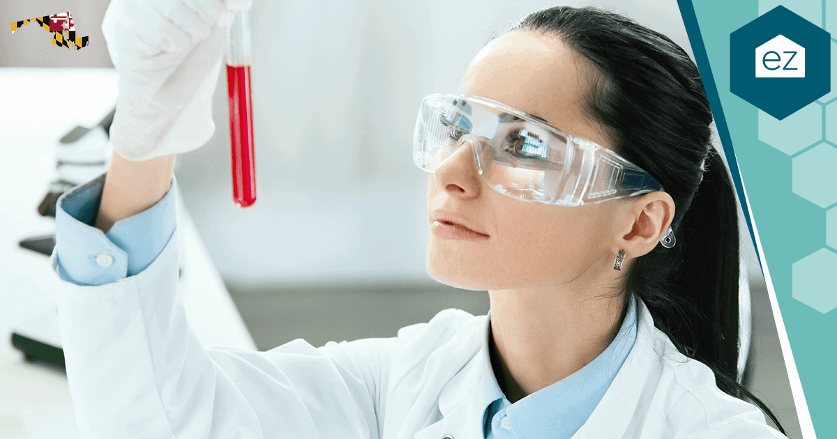 Scientist in a lab coat working in a Maryland biotech laboratory