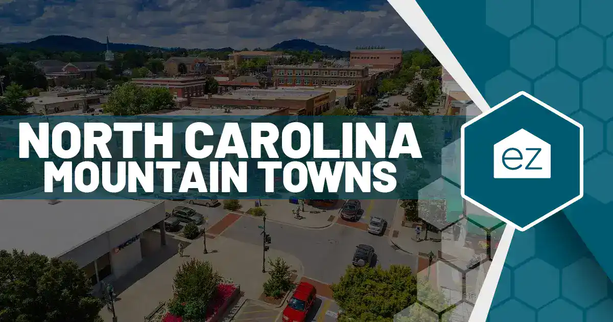 Aerial view of a small North Carolina mountain town with tree-lined streets and residential blocks