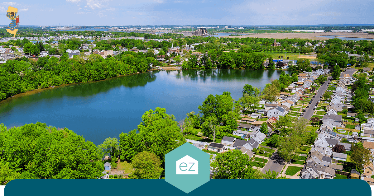 Aerial view of a New Jersey lakeside neighborhood surrounded by trees