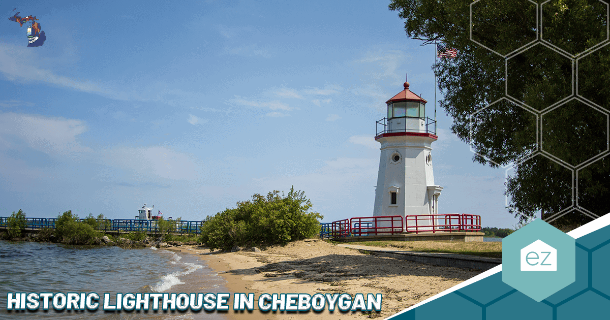 Historic white lighthouse on the water in Cheboygan, Michigan
