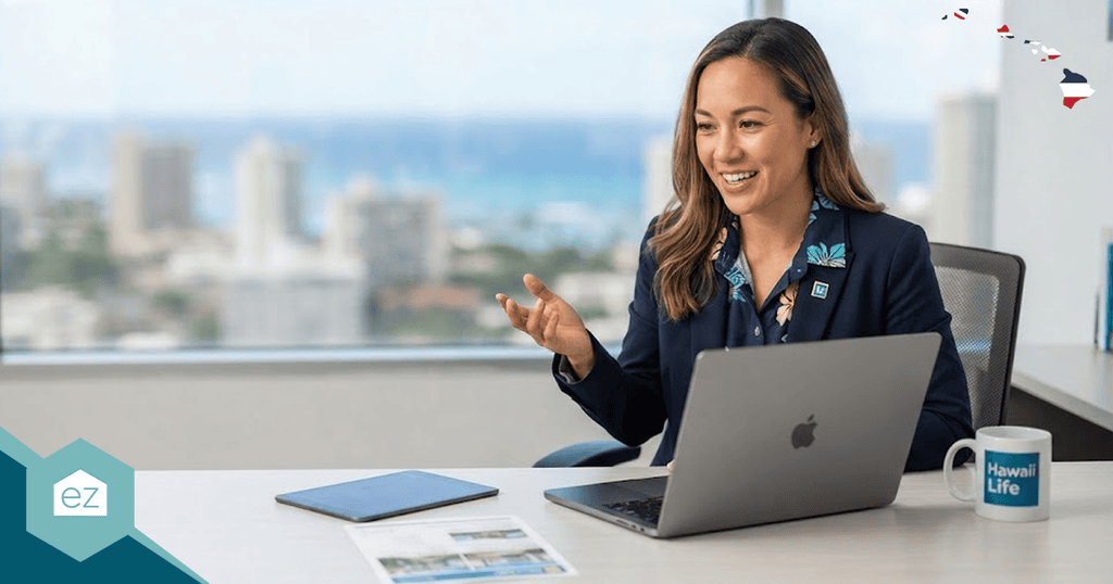 A woman sits at a desk with a laptop, tablet, mug, and papers, smiling and gesturing during a meeting about Hawaii real estate leads in an office with a city and ocean view.