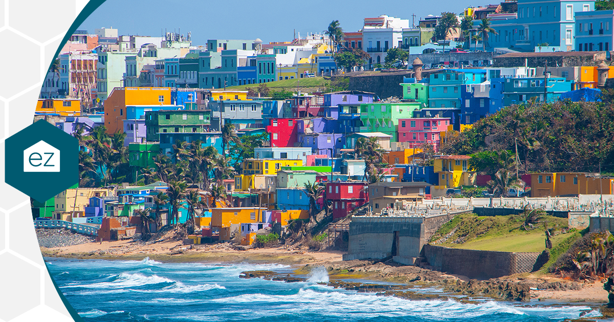 Brightly colored hillside houses above the surf in La Perla, San Juan, Puerto Rico