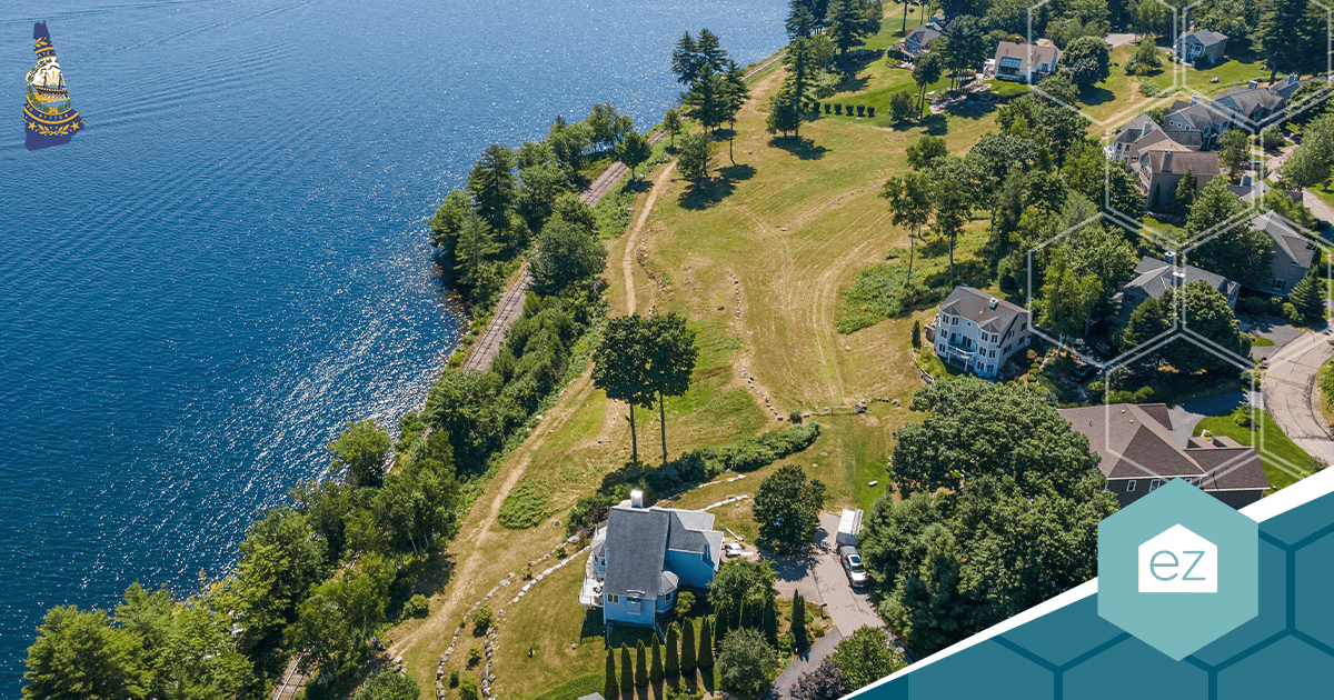 Aerial view of lake houses along a New Hampshire shoreline