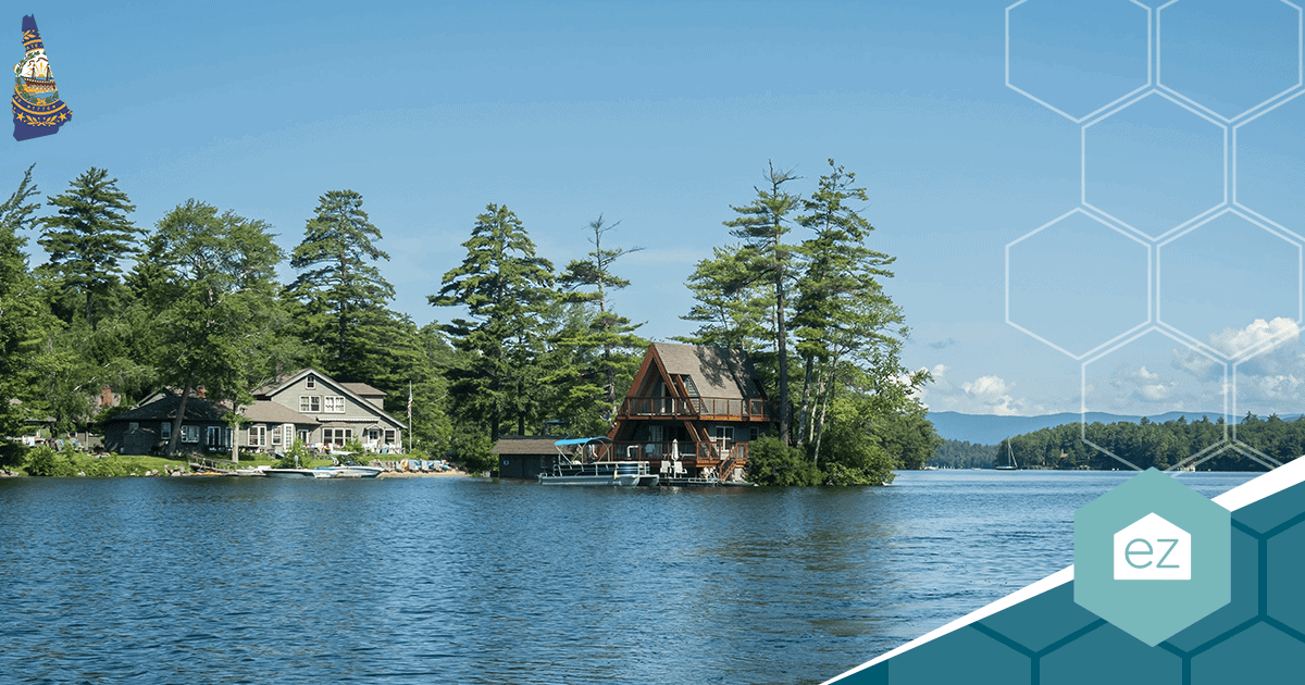 Lakefront homes among the trees on a New Hampshire lake in the Lakes Region