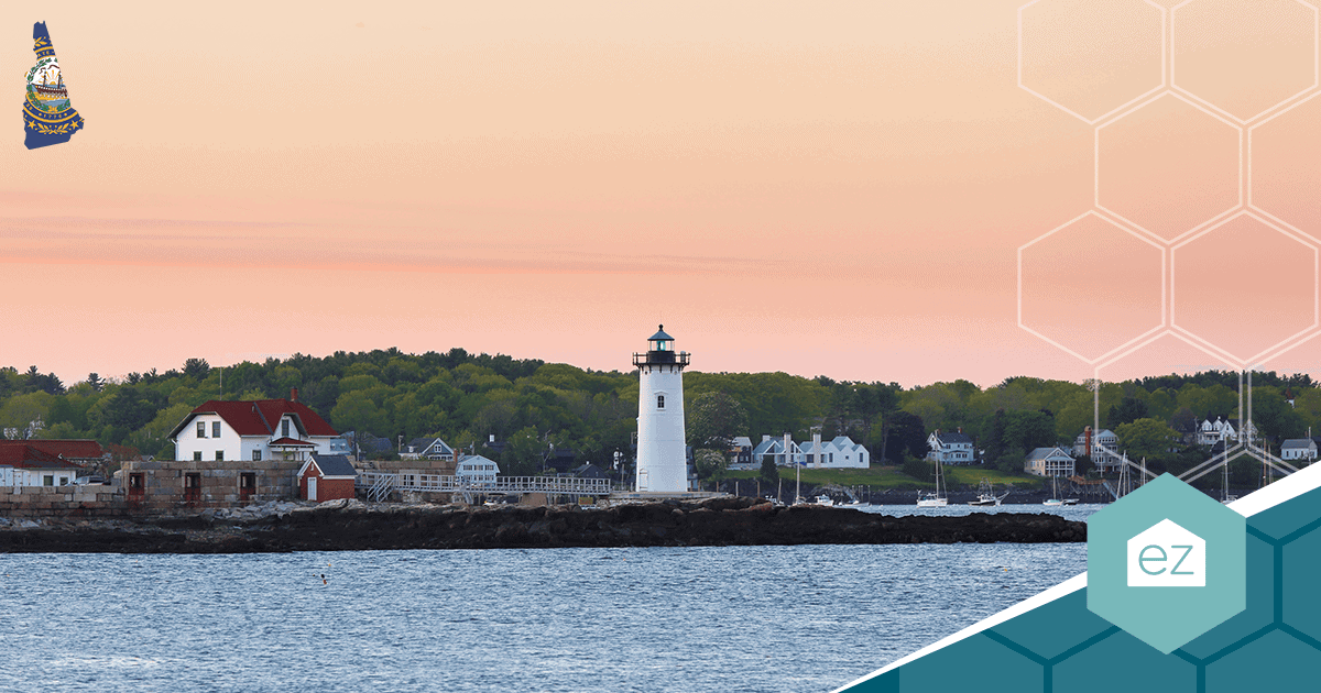 White lighthouse on the New Hampshire Seacoast at dusk