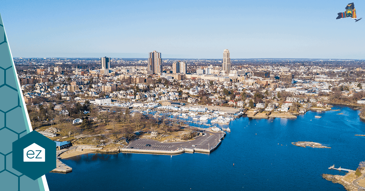 Aerial view of the New Rochelle, New York waterfront with a marina and waterfront park