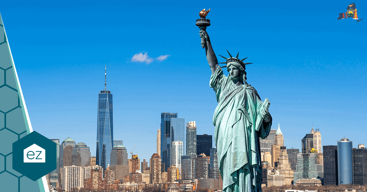 The Statue of Liberty with the New York City skyline and One World Trade Center behind it