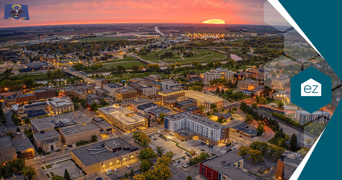 Aerial view of a North Dakota city at sunset, where most of the state's population growth is concentrated
