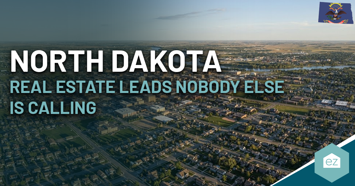 Aerial view of a North Dakota city with text overlay: “Exclusive North Dakota real estate leads nobody else is calling.” North Dakota flag in the top right corner.
