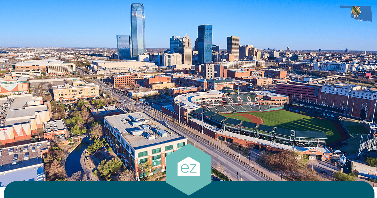 Aerial view of the Oklahoma City skyline with downtown high-rises and the ballpark, the center of the state's largest real estate market