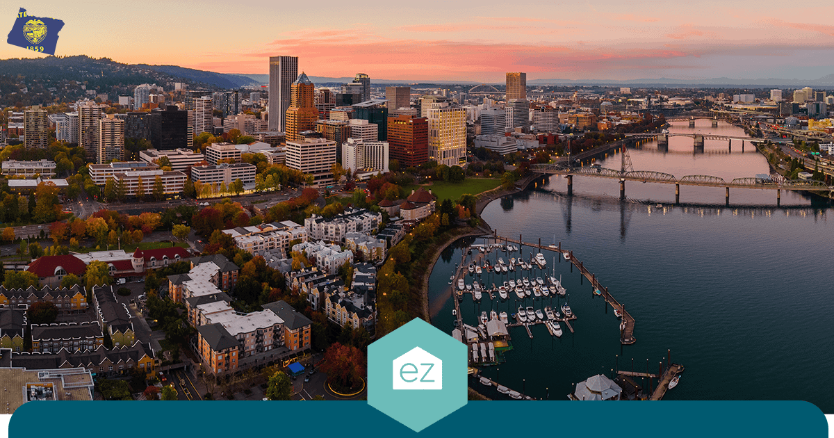 Aerial view of downtown Portland, Oregon at sunset with the Willamette River and its bridges