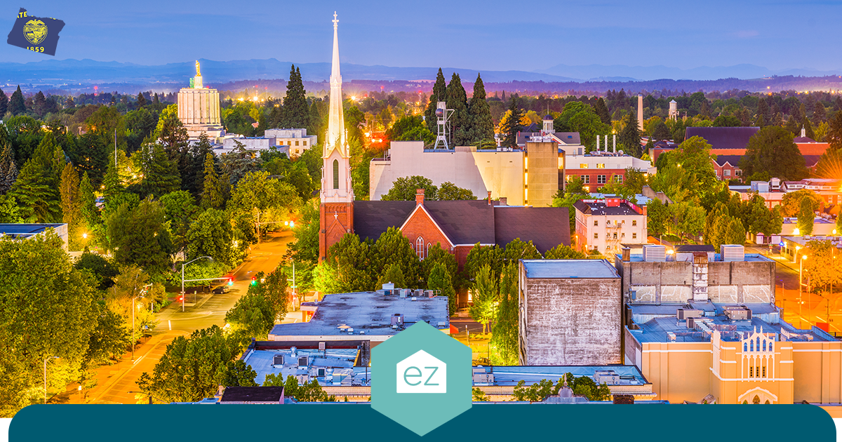 Downtown Salem, Oregon at dusk with the state capital's skyline and tree-lined streets