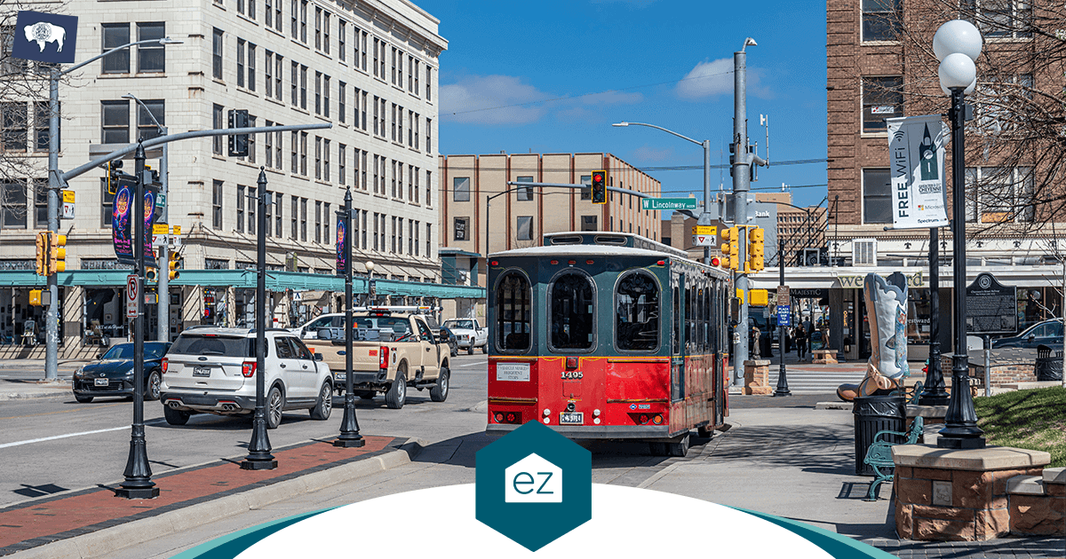A trolley on a downtown Cheyenne street in Laramie County Wyoming, where the housing cost index runs above the statewide average
